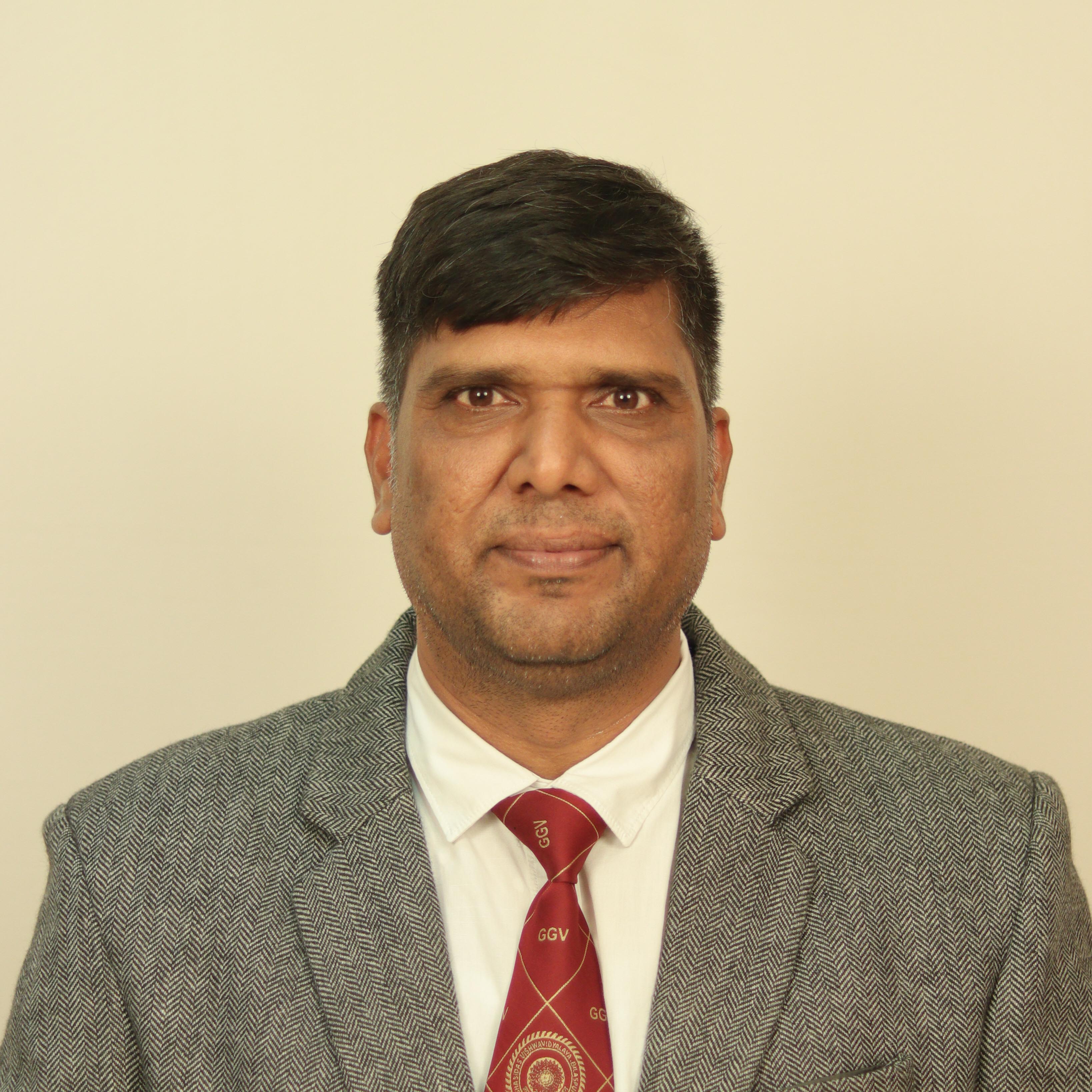 Dr. Dharmendra Kumar